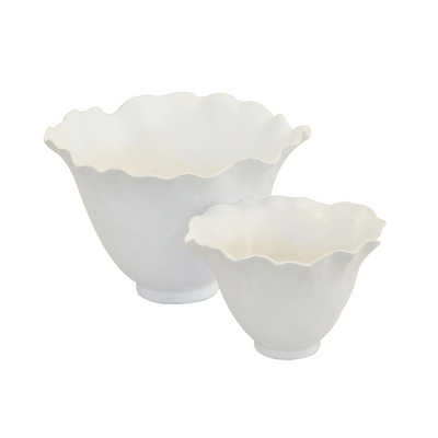 This set of ceramic scalloped petal votive planters brings a unique and modern touch to any interior. Crafted from high-quality ceramic porcelain, the planters measure 18cm (H) x 26cm (D) and 12cm (H) x 20cm (D). Enhance your home decor today with this stylish set.  Ceramic scalloped petal votive matt white s/2  Size  18CM (H) X 26CM (D)  12CM (H) X 20CM (D)  Ceramic porcelain decor planter pot.  Unique Interiors
