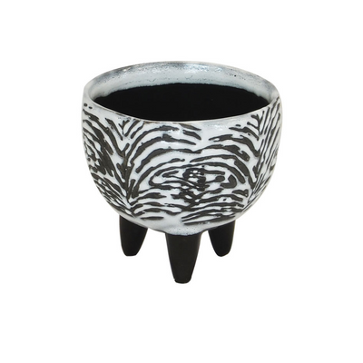 This ceramic zebra footed small is a unique addition to any interior decor. With its 14CM (D) X 13CM (H) dimensions and black effect design, this vase creates a distinct look to any room. Its unique style and lasting durability make it a perfect choice for any enthusiast of modern interiors. Ceramic zebra footed small  14CM (D) X 13CM (H)  Black effect Interior Decor vases  Unique Interiors 