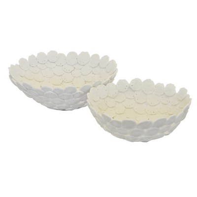 This set of two Coral Resin Disc Bowls is the perfect addition to any home. Each bowl is uniquely designed with a ceramic porcelain finish, in two different sizes – 38cm x 14cm, and 33cm x 13cm – enabling you to choose the one that best fits your interiors. Elevate your home decor with this stylish and eye-catching set.  Coral resin disc bowl white set of 2  Size  38CM X 14CM  33CM X 13CM  Ceramic porcelain decor planter pot.  Unique Interiors