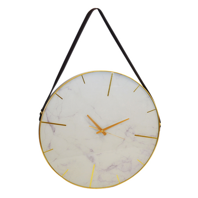 Crafted with glass, white marble and brown leather rope, this 60 cm clock adds a luxurious touch to any space, making it the perfect addition to your home decor.  Glass clock white marble 60 cm   Unique Interiors  With brown leather rope