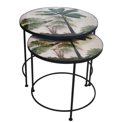 This Glass Table Nesting Palm Tree S/2 provides a stunning side table to suit any living room and interior setting. This unique piece features a larger table of 70cm (D) X 62cm (H) and a smaller table of 62cm (D) X 58cm (H). An ideal home decor item for hosting, it adds an elegant flair to any interior.