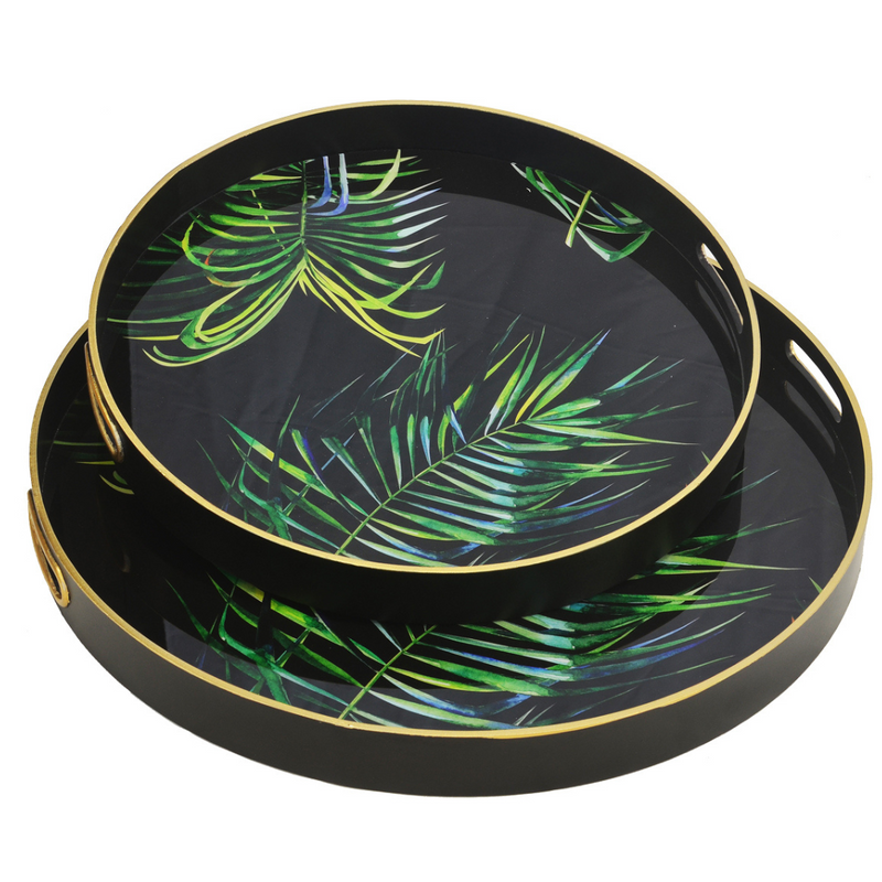 This set of two glass trays in a bamboo palm pattern provide a beautiful touch of sophistication for any home decor. The large tray measures 60cm and the small tray 50cm, making them ideal for creating a unique interior style. Perfect for hosting, these trays will add a touch of class to your living space.  Glass tray bamboo palm s/2  Size  60CM large   50CM small  Stunning trays bamboo palm to suit any living room and interior setting.  A must have for hosting home decor item  Unique Interiors 
