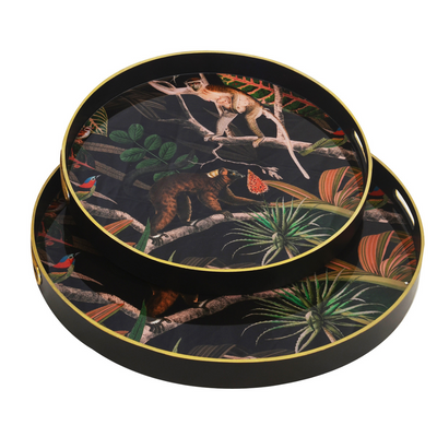 This set of two glass trays feature a wild forest monkey pattern. The larger tray measures 60 cm, while the smaller tray measures 50 cm; perfect for adding unique style to any living room. Accent modern interiors with this must-have home decor item and create a stunning hosting atmosphere.  Glass tray forest monkey s/2  60CM large   50CM small  Stunning trays forest monkey to suit any living room and interior setting.  A must have for hosting home decor item  Unique Interiors 