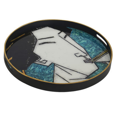 This glass tray of a geisha girl in teal is a stunning piece of decor, measuring 60cm by 5cm. Featuring a mix of green and gold, it stands out in any living space and complements a variety of interior settings. From bedrooms to balconies, this tray adds a unique and sophisticated touch.  Glass tray geisha girl teal (60cm)  Size  60CM X 5CM