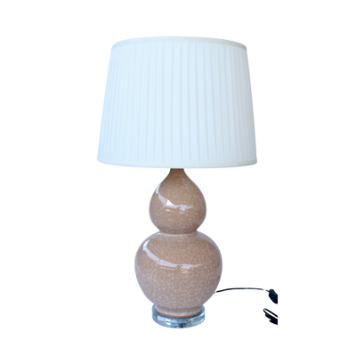 This handmade, marbled blush lamp base with cream pleated shade adds a touch of elegance to any room. Its generous 72x40cm size will brighten your lounge, bedroom, dining room, or reception area. Incorporate into your home decor with this distinctive statement piece.  Delivery 5 - 7 working days