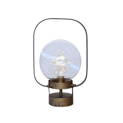This eye-catching LED battery operated round glass lantern is sure to light up your home. Dimensions: 29x18cm.  Delivery 5 - 7 working days