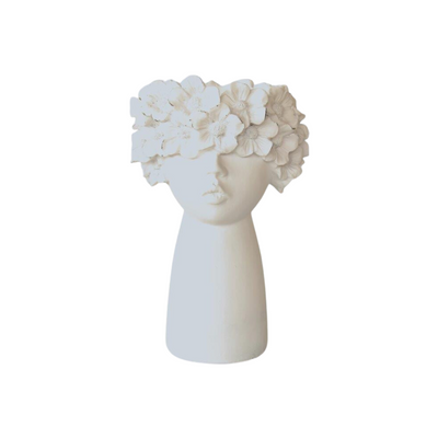 This Large White Flower Face Planter adds a touch of femininity to your home. It measures 37x19cm and has a unique design that's sure to draw attention. Add a special statement piece to your home decor with this stylish planter.  Delivery 5 - 7 working days