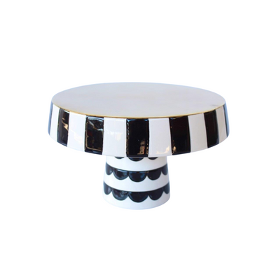 Searching for a decor piece to enliven your home? Our black and white cake stand will enhance any space. Its classic design and graceful size (14 x 23cm) make it the ideal gift for any home.  Delivery 5 - 7 working days