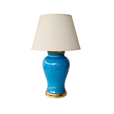 The Mid blue lamp and shade is an ideal way to introduce a tranquil atmosphere into any space. With dimensions of 70 x 42.5, it's the perfect fit for any setting. The included cream shade adds an elegant touch.  Delivery 5 - 7 working days