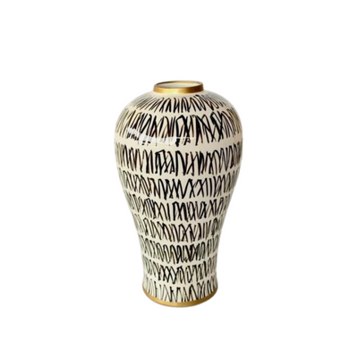 Description  This White with black design vase will add a touch of sophistication to any room in your home. It is made of ceramic and measures 43x23 cm for optimal decoration. Its sleek design will enhance the aesthetic of any home.  Unique Interiors Lifestyle      Delivery 5 to 7 working days