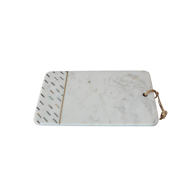 This white marble chopping board is perfect for dinner with friends and family. Its beautiful mother of pearl inserts feature unique interiors. At 35.5x20cm, it is an elegant addition to any kitchen. The marble is perfect for cutting cheese and other food items.  Delivery 5 - 7 working days