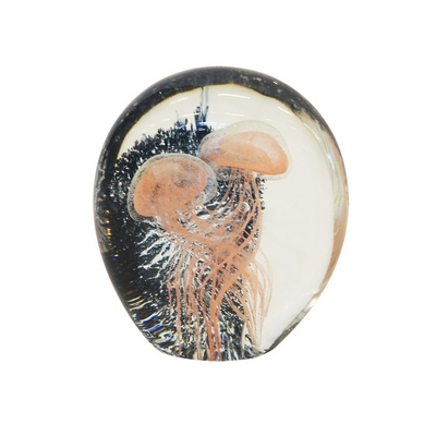 This Paperweight Jellyfish is the perfect addition to any room looking for a unique and special touch. Crafted from glass to a flat peach, this 12cm paperweight is sure to brighten up any decor. Its speckled exterior gives a special shimmer that adds a unique touch to any interior.  Paperweight jellyfish 12cm flat peach  A beautiful speckled glass paperweight. interior decor  Unique Interiors 