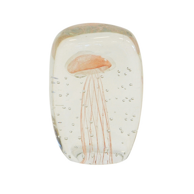 This elegant glass paperweight jellyfish is 12cm and square in shape. With its distinctive peach speckled pattern, it's a perfect addition to any room and is sure to draw attention to any interior decor. Its unique design makes it an eye-catching addition to any home.  Paperweight jellyfish 12cm square peach  A beautiful speckled glass paperweight. interior decor  Unique Interiors 