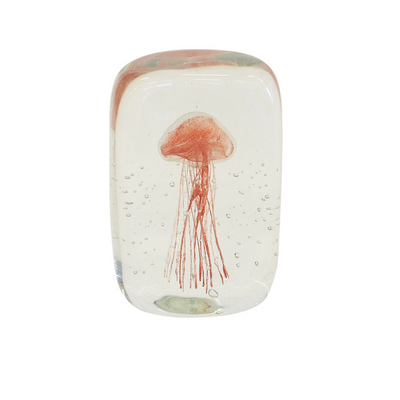 This stunning glass paperweight, featuring a 13cm square pink jellyfish motif, is the perfect addition to any interior decor. Its unique speckled glass construction adds a touch of character and charm to any room. Show off your interior design prowess with this eye-catching paperweight.  Paperweight jellyfish 13cm square pink  A beautiful speckled glass paperweight. interior decor  Unique Interiors 