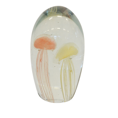 Paperweight jellyfish 16cm peach white  Introducing the stunning Glass Paperweight Jellyfish from Unique Interiors, a magnificent decorative piece that will bring a touch of oceanic charm to any room in your home. Standing at 16cm in height, this mesmerizing paperweight is expertly crafted from high-quality glass and features a gorgeous peach and white color scheme.