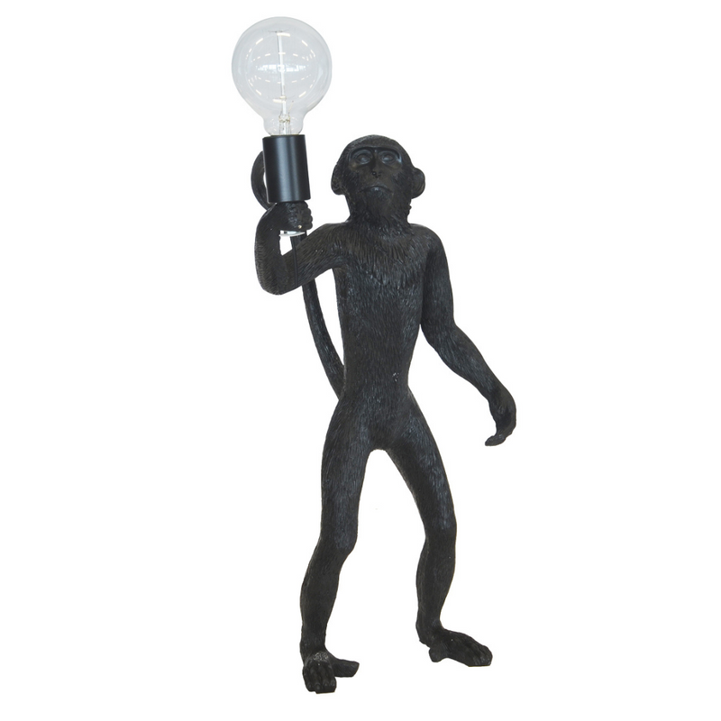 This resin monkey standing black is 55CM tall and is perfect for ornamental lighting. Its beautiful black finish provides a unique look for your interior decor, and is sure to be a talking point in any home. Whether you need an eye-catching ornamental piece or a quirky lighting fixture, this is the piece for you.  Resin monkey standing gold  55CM (H)  Beautiful standing black monkey light.  A lovely addition to any home. Interior Decor Piece.  Ornamental lighting.  Unique Interiors 