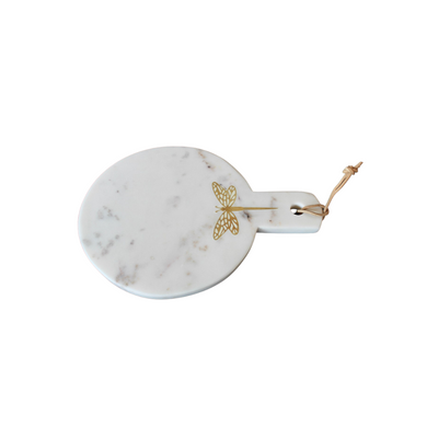 This Round Marble Brass Dragonfly Inlay Chopping Board is a perfect addition to your kitchen décor. Its size of 28x20cm makes it suitable for dinner with your family and friends. This board offers a unique look to your interior and is an ideal choice for serving cheese. Delivery 5 to 7 working days