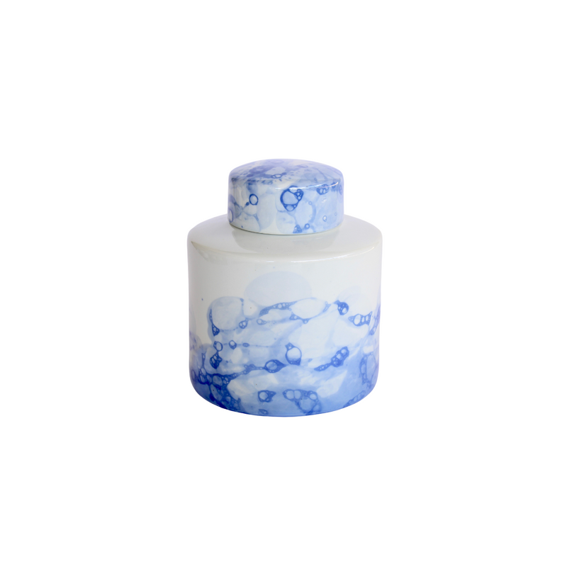 Description  This round blue jar with its elegant wave-like design offers a flattering aesthetic that can help bring a sense of peace to your living space. Perfect for use as a storage container or beautiful decoration, this 22 x 18.5 cm piece will not disappoint.  Delivery  5 - 7 Working days