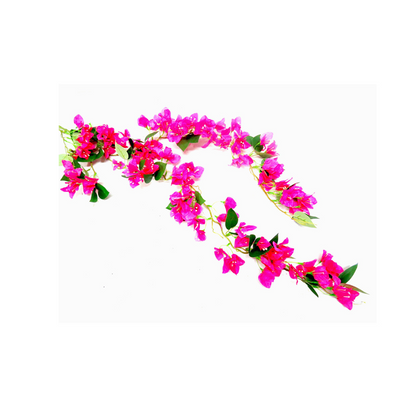 Bouganvillia Cascade boasts a full length of 120cm, showcasing a stunning cascade of bright pink blooms. Its elegant draping effect adds a touch of beauty to any space, making it the perfect addition to your home or garden- UNIQUE INTERIORS