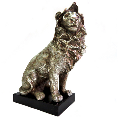 Introducing the Zimbo Lion - a stunning addition to any collection. This handsome antique silver lion stands at 12.5cm width and 15cm height on a black plinth, showcasing its beautifully formed and colored 630gms. A must-have for any lion enthusiast-unique interiors