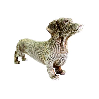 Introducing our Coco Sausage Dog, a stylish addition to any home decor. Made of high-quality silver and weighing 310gms, this 24.5 cms long and 14.5 cms high dog will add a touch of elegance to your space. Perfect as a gift or for your own enjoyment-unique interiors
