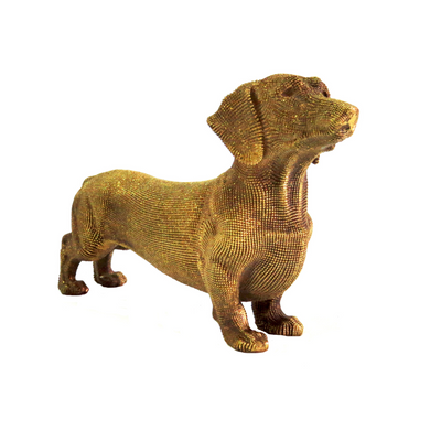 Discover the unique and stylish Leopoldina Sausage Dog. This gold-colored, 24.5cm long and 14.5cm tall item will bring a charming touch to any room. Weighing 310gms, this item is a must-have for any sausage dog lover looking for a statement piece in their home-unique -unique interiors