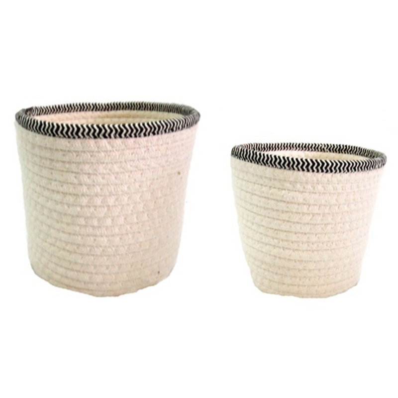 Expertly crafted from white cotton rope and accented with a sleek black and white striped border, the Rubelli Basket Set of 2 combines style and function. The larger basket measures 20 x 16 cm, while the smaller one is 17.5 cm in diameter, both offering ample storage space for your belongings. Elevate your home decor with these chic and practical baskets-unique interiors
