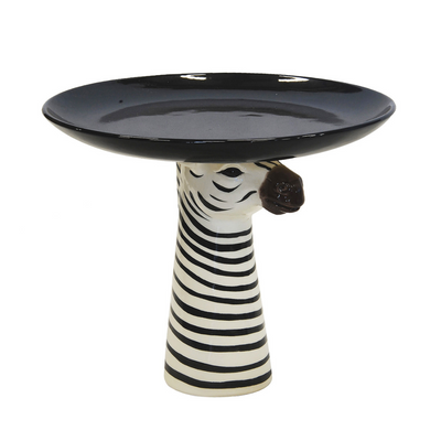 This ceramic zebra cake plate is expertly crafted at 30cm (H) and 35cm (D), making it the perfect addition to your dining collection. Its sleek design and durable material provide a stylish and functional way to showcase and serve your delicious desserts. Add a touch of elegance to any occasion with this beautiful cake plate-unique interiors