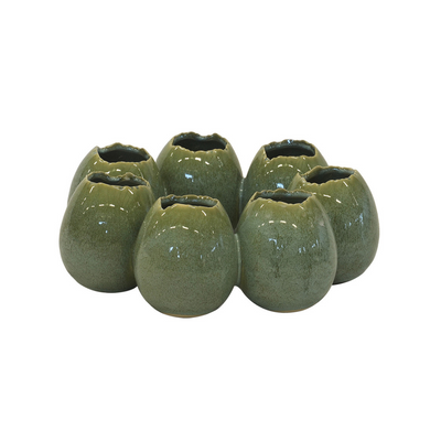 Crafted from high-quality ceramic, this Ostrich Egg Ring Vase in green is a stunning addition to any home decor. Measuring 25CM in diameter and 10CM in height, it is perfect for displaying your favorite flowers or as a standalone piece. Elevate your interior design with this unique and elegant vase-UNIQUE INTERIORS