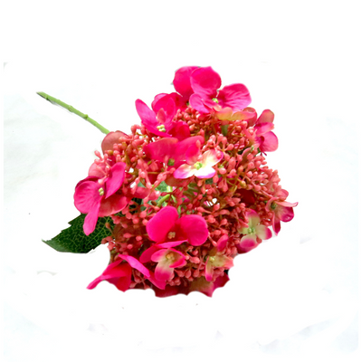 Hydrangea Beauty features 54cml of real touch open flowers, surrounded by a mix of half opened and tightly closed buds. This "paniculata" type is perfect for bridal work, showcasing a symphony of shades in bright pink. Delicate, beautiful, and vibrant – a fabulous addition to any floral arrangement-unique interiors