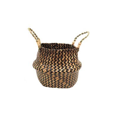 The Fia basket is an eye-catching, black and natural chevron-woven planter, perfect for any stylish home. Its high-quality construction and twisted handles make it both durable and beautiful. Fill it with your favorite plant for an elegant touch- UNIQUE INTERIORS