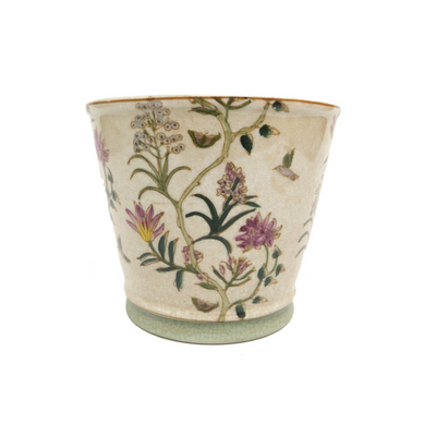 This finely crafted Needlepoint pot is perfect for livening up any space with its unique design. This pot is made with a durable fabric and ensures stability and resilience. The solid design is perfect for housing plants, flowers, and other decor items.