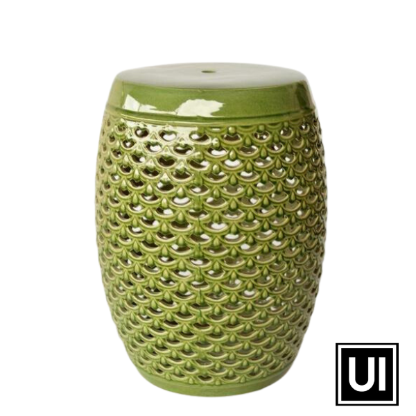 Introducing the Green Cutout Garden Stool from Unique Interiors, the perfect addition to any indoor or outdoor space. Measuring 46x32cm, this stool is handcrafted to perfection with the highest quality materials. Its green color and intricate cutout design add a touch of elegance and charm to any decor style.  Use it as a stool, a side table, or a decorative accent piece, its versatility knows no bounds. 