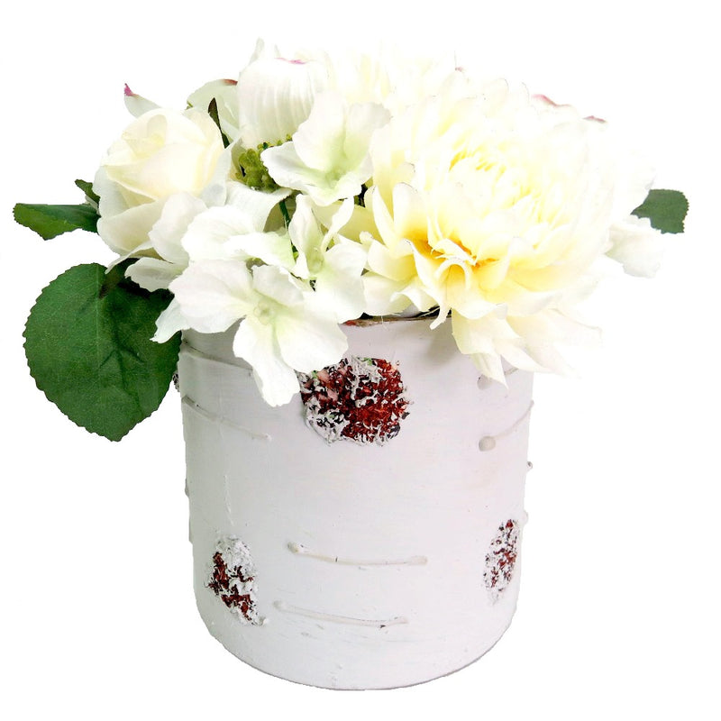 This classic white flower arrangement is perfect for sprucing up any décor. It&