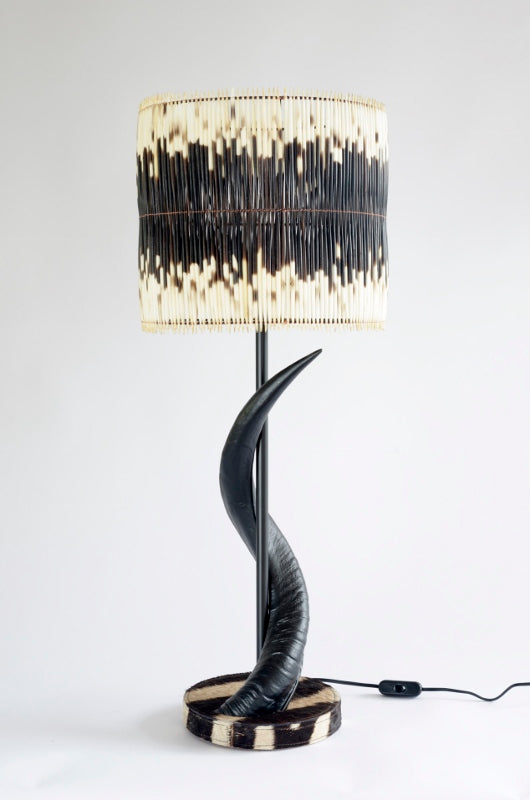 Black kudu horn lamp on zebra base and 2 x row quill shade