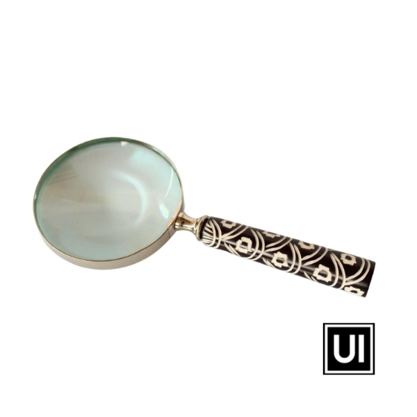 Unique Interiors Silver magnifying glass with black and white handle