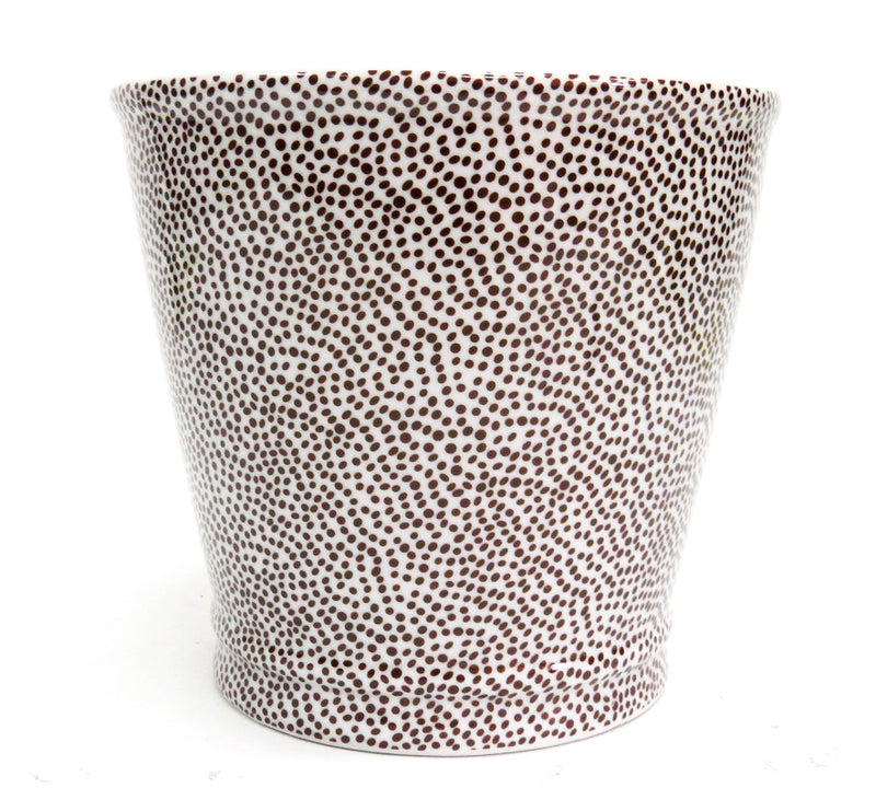 Ideal for adding a dash of African flair to your interior, the Serengetti planter is a small spotted planter with subtle accents. It measures 17.5cm in height and 16cm in width, making it perfect for adding a unique touch to any room.