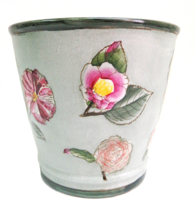 This unique Camellia pot stands out with its exquisite hand-painted detailing. 17.5cm x 16cm in size, its beautiful craftsmanship and intricate coloring will bring an elegant touch to any home. Add a touch of class and style with this stunning porcelain pot.