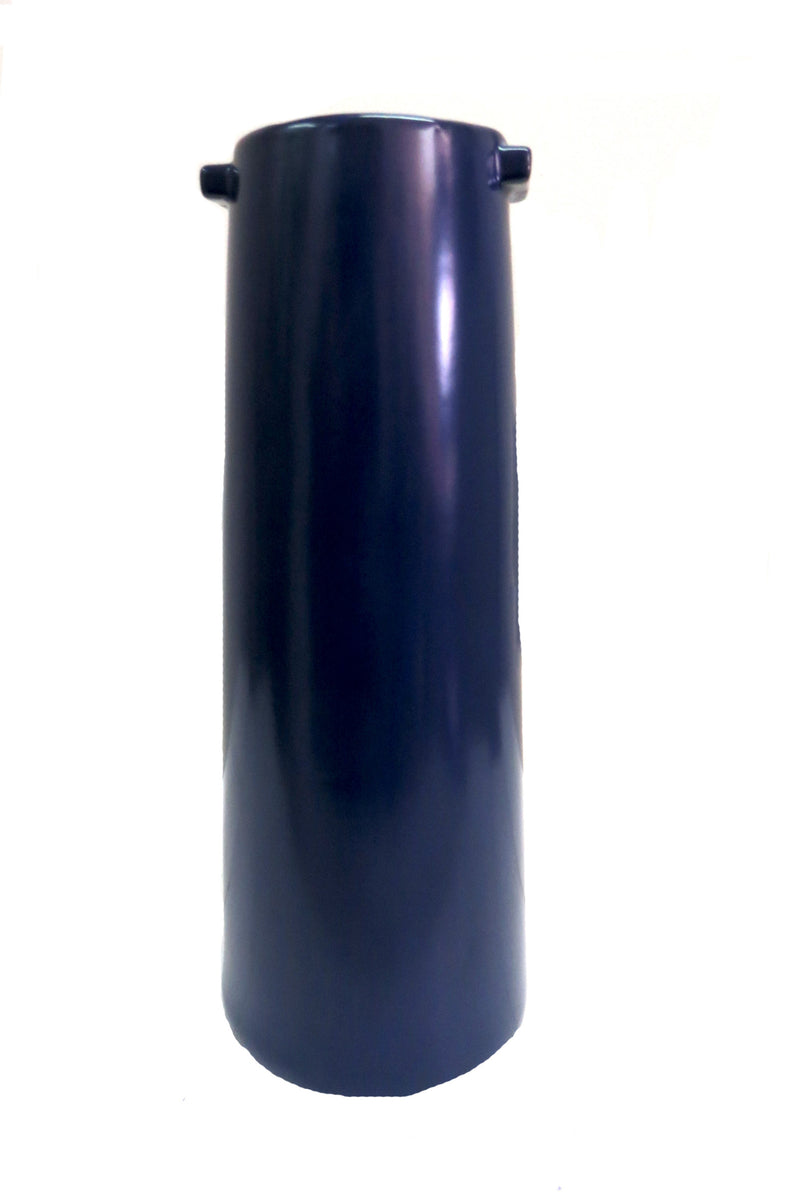 Bring life and beauty to any room with this eye-catching and timeless Nomad vase. Crafted with stunning blue ceramic, this tall vase features two handles to easily move it around and stylishly adorn any surface. Bring an elegant touch to your home with Nomad&