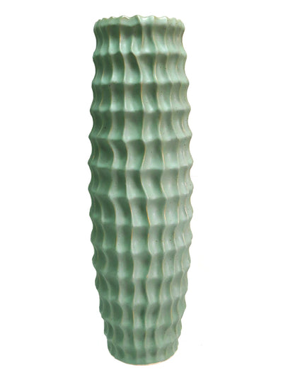 This Urbane vase is the perfect addition to any interior, featuring a ceramic structure with an interesting texture and a beautiful colour. Its extra-long profile is ideal for long-stemmed greenery, bringing natural beauty to your home or office.