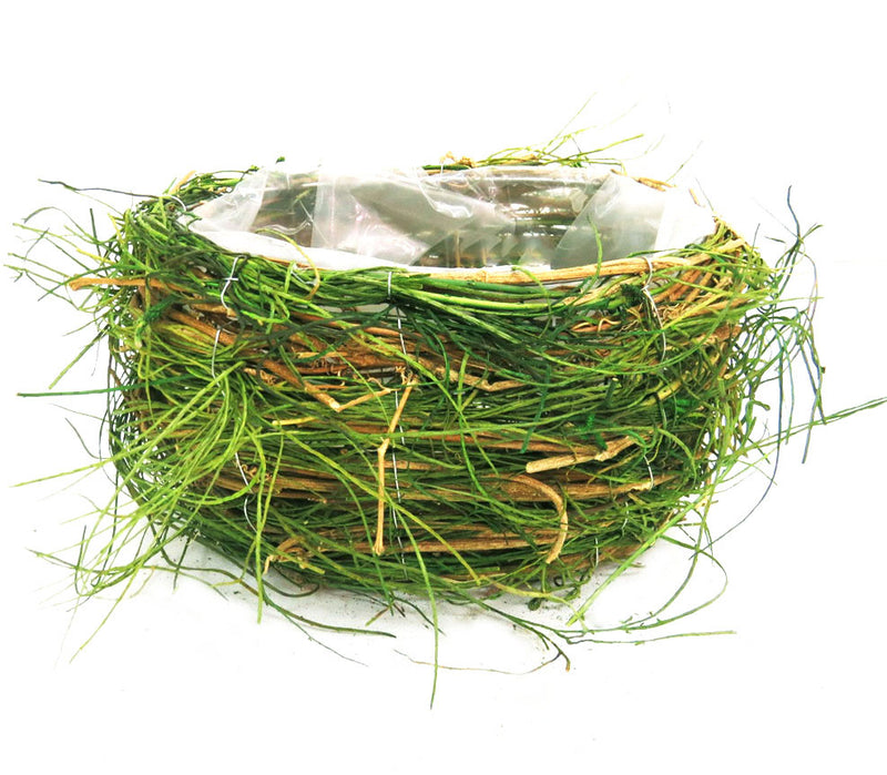 Willownest is a unique and beautiful planter, designed in the shape of a young sprouting willow. Crafted from natural woven material with plastic waterproofing, it is visible proof of nature&