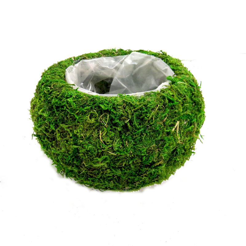 The Zara Ballvase is a waterproof, moss-covered vase that measures 15x15x10cm - perfect for adding a touch of greenery to any room. With its lined plastic interior, it&