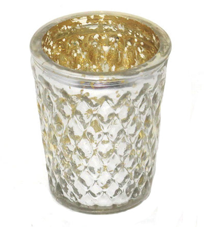 The Vidro Tealight is a stunning piece of decor, featuring a golden tealight candle holder with elegant golden specs for a touch of elegance. When lit, the candle is illuminated with a stunning beauty that will be the envy of your guests. Measuring 8.4 cm, the tealight is designed to be a beautiful addition to your home.