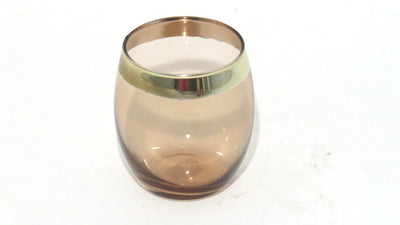 Introducing the Miracles Tealight Candle Holder. This 8cmH oval copper candle holder is perfect for creating a unique interior look. Its smooth exterior and interior details offer an exquisite touch to your décor. Add a special glow and warmth to your home and enjoy the mesmerizing ambience of a candlelight.