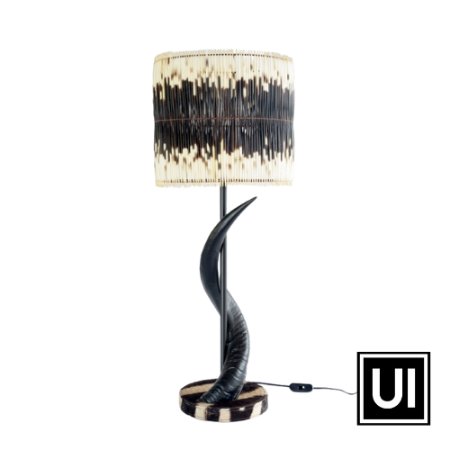 Black kudu horn lamp on zebra base and 2 x row quill shade