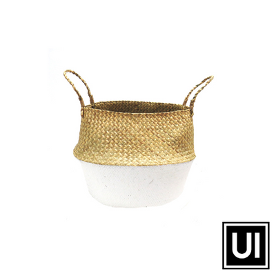 It's a big generous beauty woven in natural seagrass and painted white at the base.  Gorgeous and stylish basket/planter/multi purpose container.Unique Interiors, a place where you can find trendy decor that stays forever in style for any style. Unique Interiors.