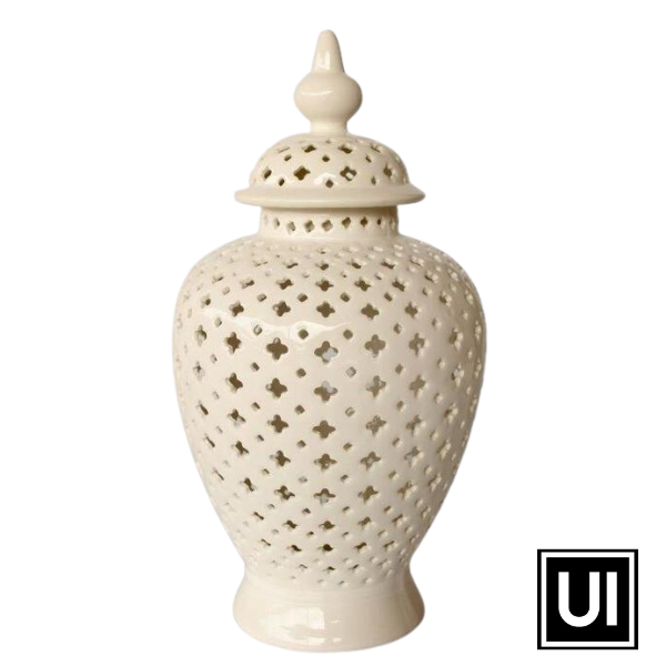 White large gut-out ginger jar 50x24cm  Introducing our Medium White Cut-Out Ginger Jar from Unique Interiors, a stunning piece that will add a touch of elegance and sophistication to any space in your home. This ginger jar is expertly handcrafted to perfection, ensuring the highest quality of craftsmanship.