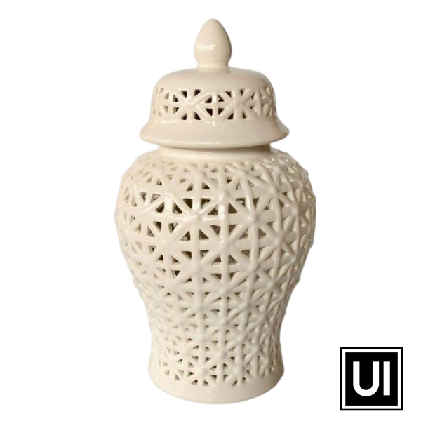 White criss cross cut-out ginger jar 41x22cm  Introducing our White Criss Cross Cut-Out Ginger Jar from Unique Interiors, a beautiful piece that will add a touch of timeless elegance to any decor. Handcrafted to perfection, this jar is made from the highest quality materials, ensuring durability and longevity.